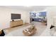 Stylish living room and eat-in kitchen with wood floors and modern furnishings at 2280 Cannon Farm Rd, China Grove, NC 28023