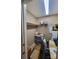 A small closet converted into a workspace with a desk and shelving for organization at 2777 Old South Nw Ct, Concord, NC 28027