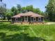 Front of charming single-story home with manicured lawn and neat landscaping, enhancing curb appeal at 2777 Old South Nw Ct, Concord, NC 28027