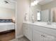 Bright bathroom features a double vanity and a view of the bedroom at 2785 Disney Pl, Indian Land, SC 29707