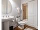 Clean bathroom featuring a pedestal sink, toilet, and shower at 2785 Disney Pl, Indian Land, SC 29707