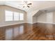 Bright bonus room featuring hardwood floors, natural light, and a ceiling fan at 2785 Disney Pl, Indian Land, SC 29707
