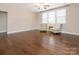 Spacious living room with hardwood floors and two chairs by the window at 2785 Disney Pl, Indian Land, SC 29707
