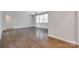 Spacious living space with hardwood floors, large windows, and ample natural light at 2785 Disney Pl, Indian Land, SC 29707