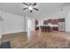Open living space features hardwood floors and a kitchen, dining, and living area at 2785 Disney Pl, Indian Land, SC 29707