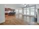 Spacious living area showcases hardwood floors, a cozy fireplace, and an open layout leading to the kitchen at 2785 Disney Pl, Indian Land, SC 29707