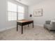 Bright office features a wooden desk and carpet floors at 2785 Disney Pl, Indian Land, SC 29707