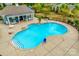 Aerial view of neighborhood pool and lounge area with mature landscaping for privacy at 2785 Disney Pl, Indian Land, SC 29707