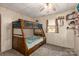 Bedroom with bunk beds, neutral walls, carpet and window letting in lots of light at 310 Yarbro Rd, Kings Mountain, NC 28086