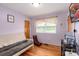 Cozy bedroom with natural light, futon, and gaming chair at 310 Yarbro Rd, Kings Mountain, NC 28086
