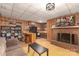 Cozy living room with a fireplace, kitchenette, and entertainment area at 310 Yarbro Rd, Kings Mountain, NC 28086