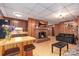 Inviting living room featuring a brick fireplace, kitchenette, and comfortable seating area at 310 Yarbro Rd, Kings Mountain, NC 28086