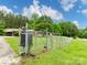 A fenced yard with a house and trees in the background at 310 Yarbro Rd, Kings Mountain, NC 28086
