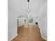 Open-concept living space with modern lighting, hardwood floors, and white trim at 3104 Doncaster Dr, Rock Hill, SC 29732