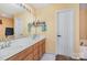 Bathroom featuring a dual vanity, large mirror, and modern fixtures at 3236 Wicklow Ln, Clover, SC 29710