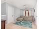 Cozy bonus room featuring a comfortable sectional, soft carpet, and natural light at 3236 Wicklow Ln, Clover, SC 29710