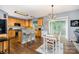 Eat-in kitchen with wood cabinets, a breakfast bar, and sliding glass doors at 3236 Wicklow Ln, Clover, SC 29710