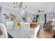 Open living and dining area with a staircase, hardwood flooring, and natural light at 3236 Wicklow Ln, Clover, SC 29710