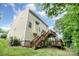 A view of the exterior, showcasing a multi-level deck, siding, and backyard at 3236 Wicklow Ln, Clover, SC 29710
