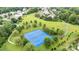 Aerial view of the community tennis courts bordered with beautiful landscaping and walking path at 3236 Wicklow Ln, Clover, SC 29710