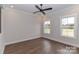 Spacious bedroom features beautiful hardwood floors and natural light from the windows at 332 Canvasback Rd, Mooresville, NC 28117