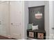 This mudroom features custom shelving and storage space at 332 Canvasback Rd, Mooresville, NC 28117