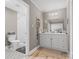 Neutral bathroom with patterned floor, framed vanity, and glass-enclosed marble shower at 3367 Tanglewood Dr, Rock Hill, SC 29732
