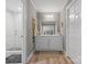 Bright bathroom with white cabinets, a shower with a glass door, and stylish fixtures at 3367 Tanglewood Dr, Rock Hill, SC 29732