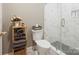 Shower and toilet area featuring a glass shower door and complementary decor at 3367 Tanglewood Dr, Rock Hill, SC 29732