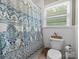 White-tiled bathroom featuring a vibrant shower curtain with patterned design at 3367 Tanglewood Dr, Rock Hill, SC 29732