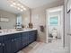Dual sink vanity and toilet area with a walk-in shower in an adjacent space at 3367 Tanglewood Dr, Rock Hill, SC 29732