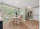 Cozy breakfast nook with natural light and neutral tones offers a relaxing dining area adjacent to the kitchen at 3367 Tanglewood Dr, Rock Hill, SC 29732