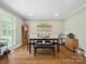 Bright dining room with a wooden table, bench, and large window for natural light at 3367 Tanglewood Dr, Rock Hill, SC 29732