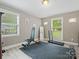 Home gym with exercise equipment, including a weight bench, treadmill, and free weights at 3367 Tanglewood Dr, Rock Hill, SC 29732