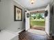 Inviting foyer with a unique tiled floor and view to the front yard through open double doors at 3367 Tanglewood Dr, Rock Hill, SC 29732