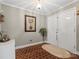 Inviting foyer with a unique tiled floor, decor, and double doors to the front at 3367 Tanglewood Dr, Rock Hill, SC 29732