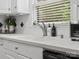 Close up of a kitchen counter with a sink, faucet, and decorative accents at 3367 Tanglewood Dr, Rock Hill, SC 29732