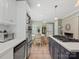 Bright, open kitchen featuring a cozy breakfast nook and modern appliances at 3367 Tanglewood Dr, Rock Hill, SC 29732