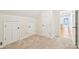Attic with neutral carpet features three white paneled doors at 3916 Blowing Rock Way, Charlotte, NC 28210