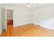Spacious bedroom with hardwood floors and direct access to bonus room at 3916 Blowing Rock Way, Charlotte, NC 28210