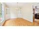Dining room features natural light and built-in cabinets, perfect for meals at 3916 Blowing Rock Way, Charlotte, NC 28210