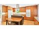 This kitchen features wooden cabinets, modern appliances, and a granite countertop island at 3916 Blowing Rock Way, Charlotte, NC 28210