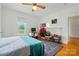 Bright bedroom with hardwood floors, lots of natural light and neutral paint at 435 Sixteenth St, Cramerton, NC 28032