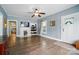 Inviting living room with hardwood floors, built-in shelves, fireplace, and ample natural light at 435 Sixteenth St, Cramerton, NC 28032
