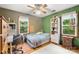 Bedroom featuring hardwood floors, natural light, a desk, and bookcase at 4848 Spicewood Dr, Charlotte, NC 28227