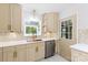 Updated kitchen with quartz countertops, stainless steel appliances, and modern fixtures at 4913 Seacroft Rd, Charlotte, NC 28210