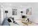 Bright living room with hardwood floors, ample natural light, and stylish furnishings at 4913 Seacroft Rd, Charlotte, NC 28210