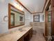 Bathroom with a long vanity, a large mirror, and a soaking tub at 5109 Goldcrest Dr, Indian Trail, NC 28079