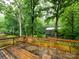 Deck view overlooking the wooded backyard at 5109 Goldcrest Dr, Indian Trail, NC 28079