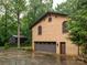 Brick house with a large garage and manicured lawn, offering classic curb appeal at 5109 Goldcrest Dr, Indian Trail, NC 28079